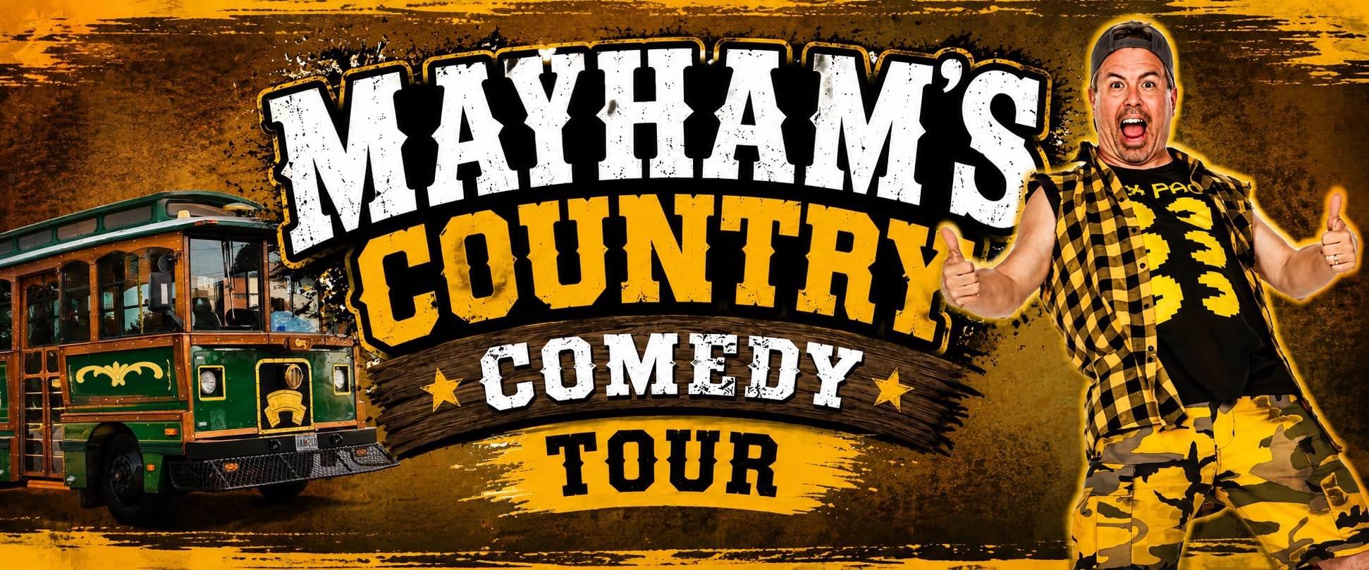MayHam next to the Branson trolley bus — Mayham's Country Comedy Tour banner